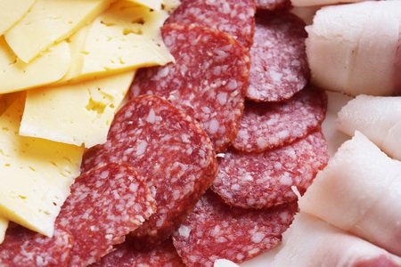 Ham, salami, sausage and cheese food plateの写真素材