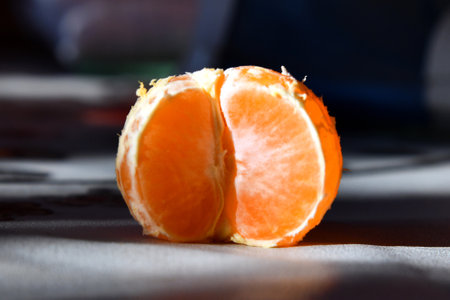 Balancing citrus fruits on the table. Pyramid of citrus fruits: grapefruit, lime, orange, lemon