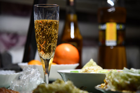 Set of luxury champagne glasses in a row on a black background. Concept of winemaking and restaurant businessの写真素材