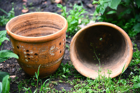 Wine aging in modern clay amphorae in a wine cellarの写真素材