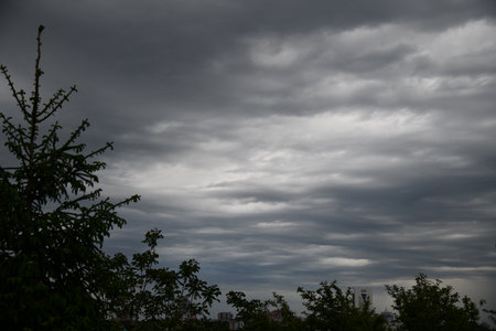 Dark clouds over a landscapeの写真素材