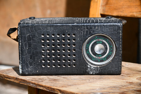 Vintage radio on a wooden tableの写真素材