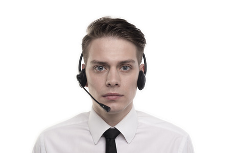 Close-up photo of a young calm agent of call center
