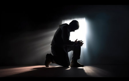 silhouette Man praying in my room before God. Generative AI.の素材