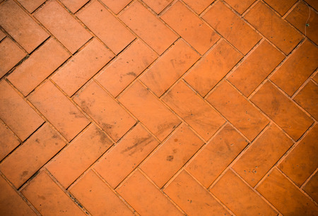 Closeup terracotta ceramic Orange tile floor background