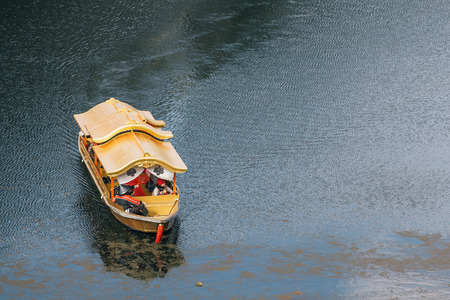 OSAKA, JAPAN - November 3: Sightseeing Boat Around the Osaka Castle Canal on November 3, 2015 in Osaka, Japan.のeditorial素材