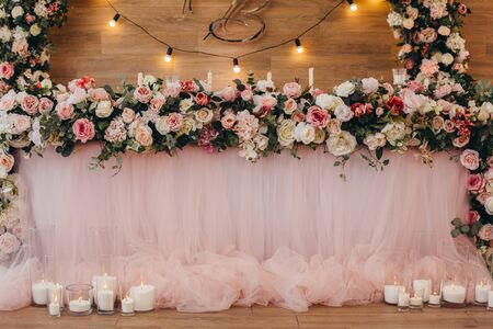 Wedding banquet bride and groom table pink closeup.の写真素材