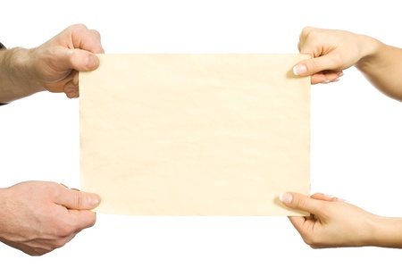Paper blank leaf in female and man's hands