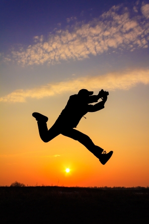 The silhouette of the photographer in natureの写真素材