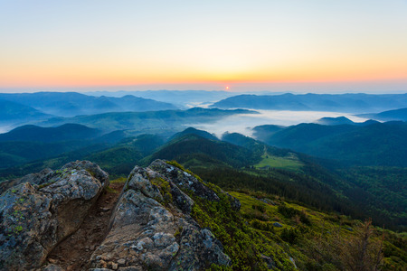 Morning mist at sunrise in the Carpathian mountainsの写真素材