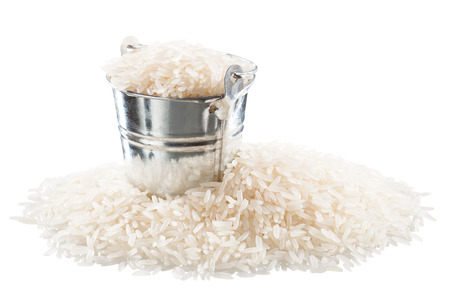 Rice in a bucket on a white backgroundの写真素材