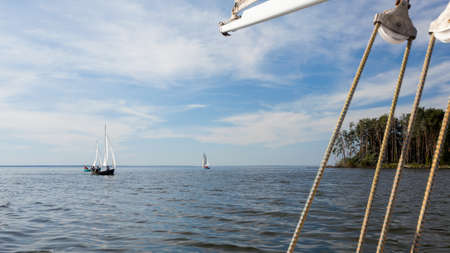 Sailing dinghies, sailing on yachts on water