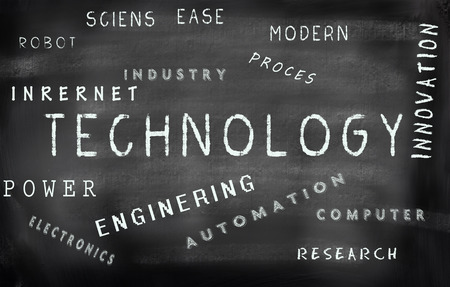 Technology word cloud written on a chalkboardの写真素材