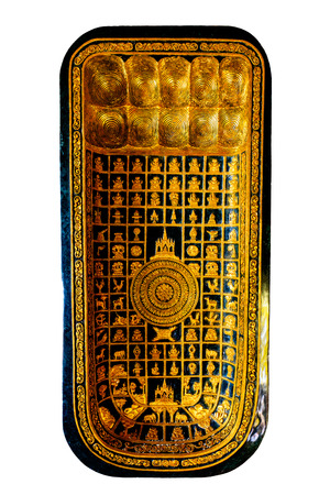 Statue of footprint of reclining golden buddhaの写真素材