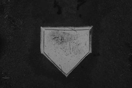 Well used baseball home plate.の写真素材