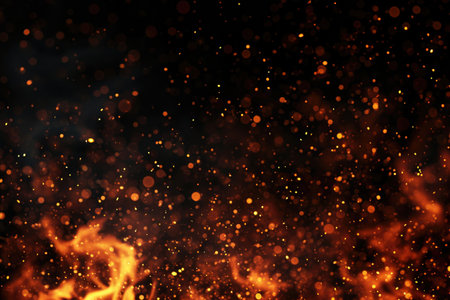 Fuel your creative projects with this vibrant image of flames on a bold black background, adding intensity to your designs.の素材