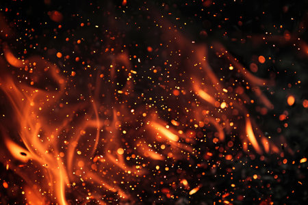 Fuel your creative projects with this vibrant image of flames on a bold black background, adding intensity to your designs.の素材
