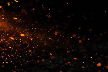 Fuel your creative projects with this vibrant image of flames on a bold black background, adding intensity to your designs.の素材