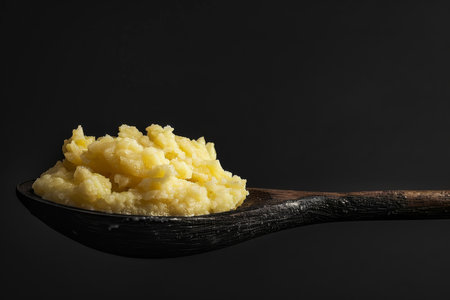 Delicious creamy mashed potatoes with butter, fresh herbs and freshly-cracked black pepperの素材