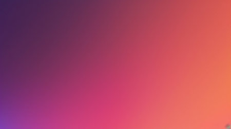 A digital illustration of a smooth gradient transitioning from dark purple to light pink and orange.の素材