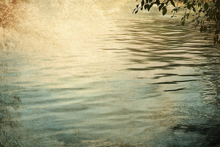 A serene image of a calm body of water with a silhouetted tree branch hanging over it, featuring a grunge texture.の素材