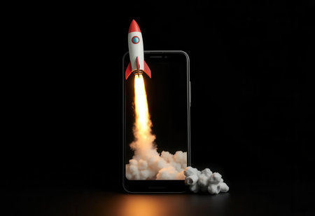 A red and white toy rocket is shown launching from a smartphone screen, leaving a trail of smoke and fire.の素材