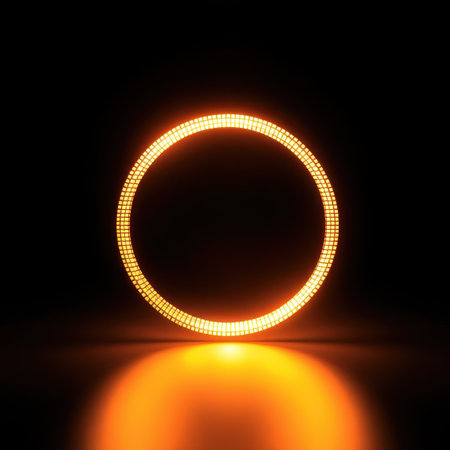 An abstract image featuring a glowing orange circle of light against a black background creating a minimalist aesthetic.の素材