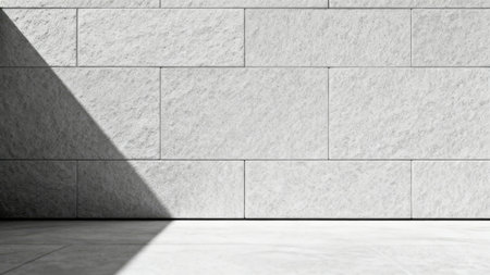 Photorealistic 3D render showing rough textured white stone tile wall and floor featuring a dramatic triangular dark shadow caused by sharp exterior illumination and high contrast.の素材
