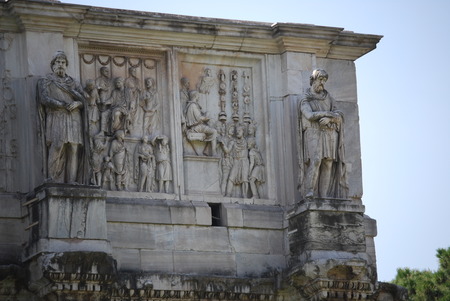 Arch of Constantine in Rome next Coliseumの写真素材