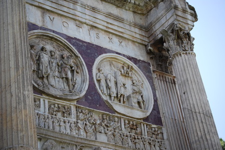 Arch of Constantine in Rome next Coliseumの写真素材