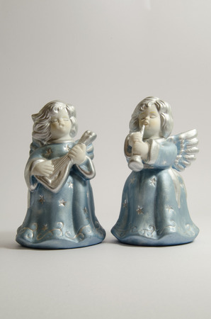 Angel statue on white backgroundの写真素材