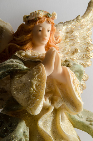 Angel statue on white backgroundの写真素材