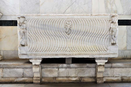 Tomb sculptures in the Monumental Cemetery at the Leaning Tower of Pisaの写真素材