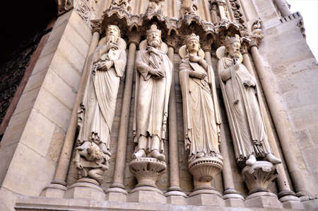 Paris, France - famous Notre Dame cathedral facade saint statues.の写真素材