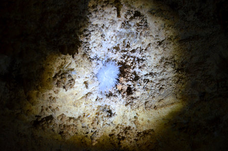 Inside of beautiful old dark cave with many stalactites. Caves of Is Zuddas, Italy, Sardiniaの写真素材