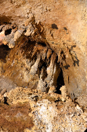 Inside of beautiful old dark cave with many stalactites. Caves of Is Zuddas, Italy, Sardiniaの写真素材