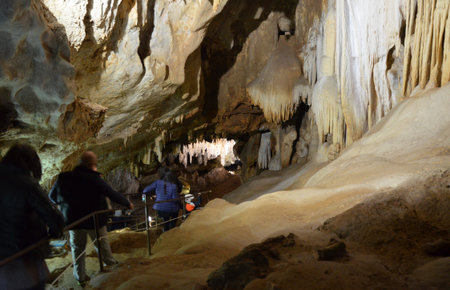 Inside of beautiful old dark cave with many stalactites. Caves of Is Zuddas, Italy, Sardiniaの写真素材