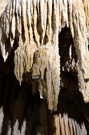 Inside of beautiful old dark cave with many stalactites. Caves of Is Zuddas, Italy, Sardinia