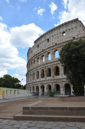 Rome, Italy 02.09.2019: Colosseum (Coliseum) is one of main travel attraction of Rome, Italy. Ancient Roman ruins of Colosseum, landscape of old Rome city, Italy.のeditorial素材