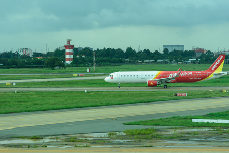 Ho Chi Minh - Nov 6, 2016: VietJet airlines on runway the Ho Chi Minh airportのeditorial素材