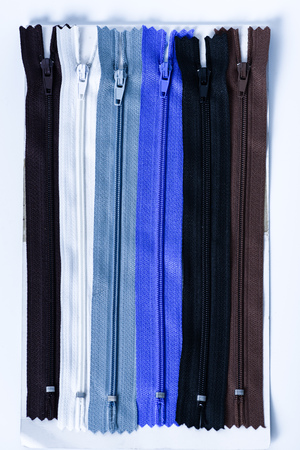 colorful zipper for tailoring on white backgroundの写真素材