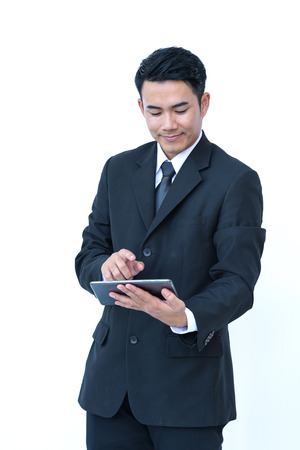 businessman hand on mobile phone play social mediaの写真素材