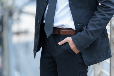 smart businessman Hand put pocket when business successの写真素材