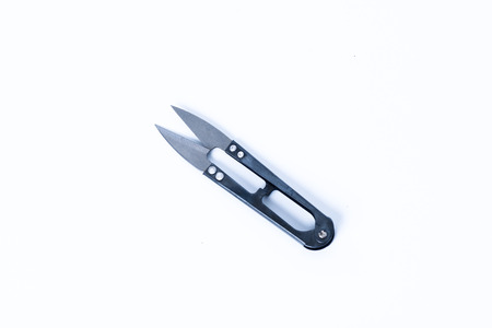 Scissors cut  thread isolated on white backgroundの写真素材
