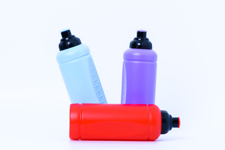 Plastic water bottles for exercise on white backgroudの写真素材
