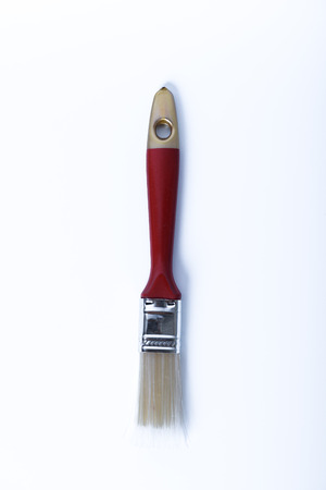 red paintbrush isolated on white backgroundの写真素材