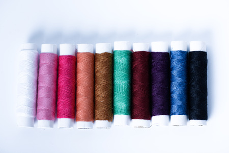 spool of thread on white backgroundの写真素材