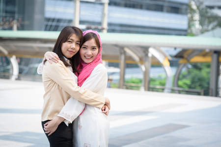 arabian hug businesswoman when first time to talking about businessの写真素材