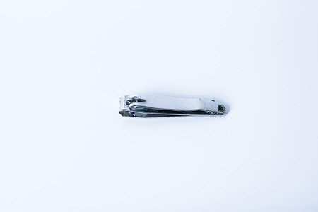 old stainless nail clipper isolated on white backgroundの写真素材