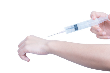 inject hand holding plastic Syringe medical injection for Health care in hospitalの写真素材